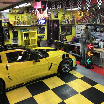 Yellow Corvette, Neon Signs, and Racing Decor Garage - Skream N' Bee from Cliffside Park, NJ