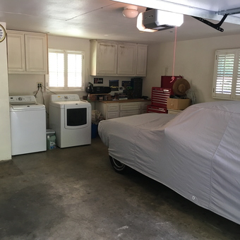 Organized garage with car cover, tool chest, cabinets - Mark from Redlands, California