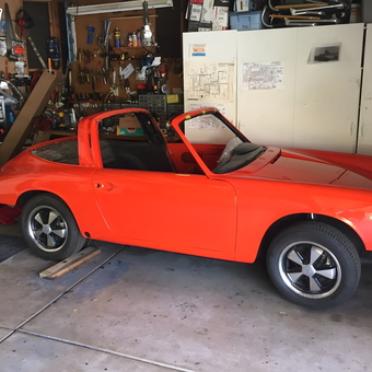 Organized garage with red classic car and wall storage - Fred Adler from San Diego, CA