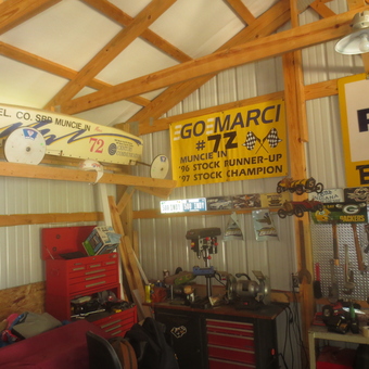 Garage with tool chest, workbench, and wall signs - Mark from Muncie, Indiana