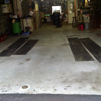 Organized garage with floor mats and wall storage - Mark from Park Hills, KY