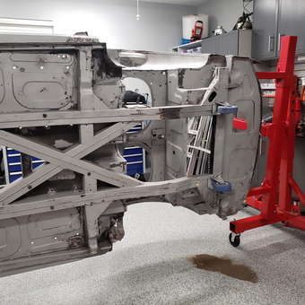 Car Body on Rotisserie in Organized Garage - Westcoast M5 from North Vancouver, British Columbia