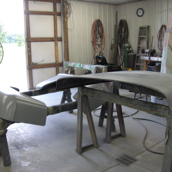 Auto Body Panels on Sawhorses in Organized Garage - Diane from Hanna, Indiana