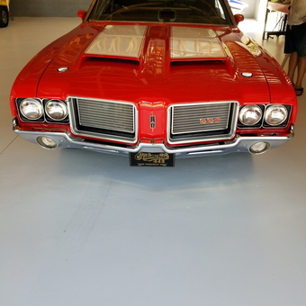 Classic red Oldsmobile 442 muscle car in garage - Pete from Alva, FL