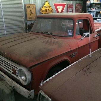 Vintage Dodge Truck and Road Signs in Garage - Area66Garage from Bloomington, MN