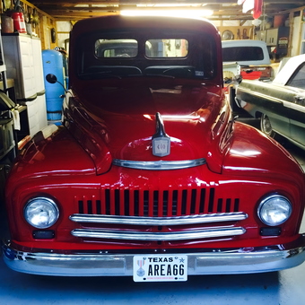 Classic Red Pickup and Vintage Cars in Garage - Area66Garage from Bloomington, MN