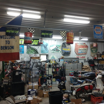 Vintage garage with signs, scooter, and tools - Killer from Benson, MN