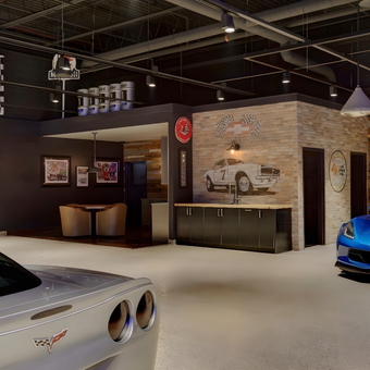 Custom Corvette Garage With Wall Art and Cabinets - Brian