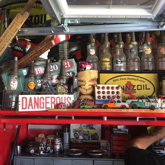 Vintage Oil Bottles, Signs, and Model Cars Display - The kid from Pleasanton, CA