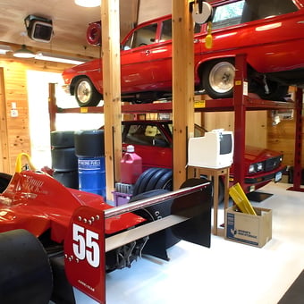 Dual Post Car Lift with Classic Cars and Racing Tires - Car Lifts