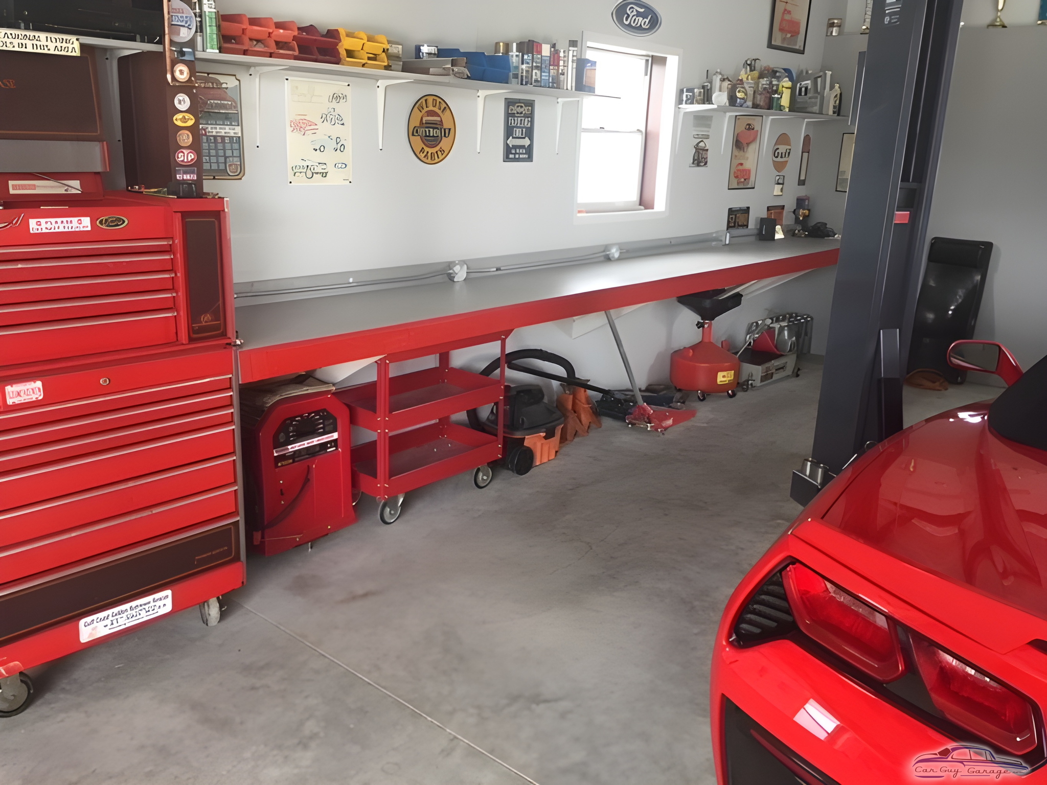 Organized garage with red tool chests and workbench - Dave's Garage from Port Charlotte, FL