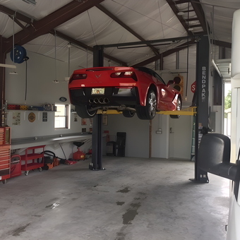 Organized garage with car lift and tool chests - Dave's Garage from Port Charlotte, FL