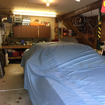 Organized Garage with Covered Car and Storage Cabinets - Don from North East, Pa