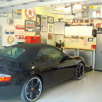 Organized garage with cabinets, metal lockers, and decor - Wayne from Bradenton, FL