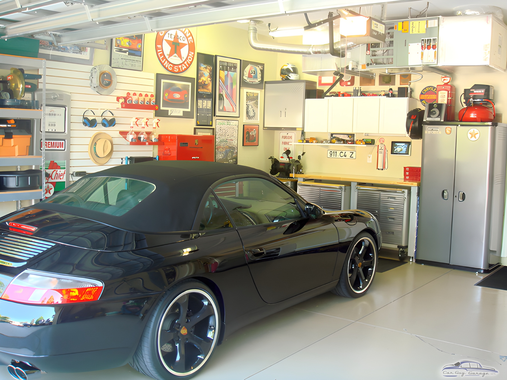 Organized garage with cabinets, metal lockers, and decor - Wayne from Bradenton, FL