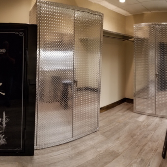 Diamond Plate Cabinets and Safe in Organized Garage - Sal's Sportsman's Closet