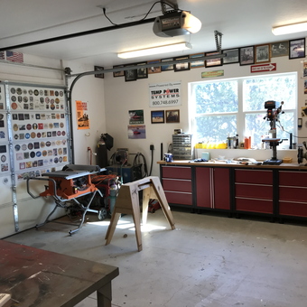 Organized garage with red cabinets and workbench - weenie from PRESCOTT, AZ