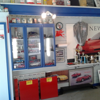 Mobil Garage Decor, Model Cars, and Trophies Display - Dick from Norwich, NY