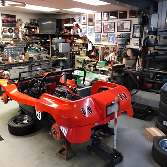 Well-equipped garage with red kit car and tools - Calvin from Suffolk, VA