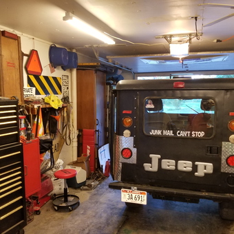 Garage with Jeep, Tool Chest, and Wall Signs - James Allen Jackson from Christopher, IL