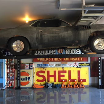 Classic Car on Four Post Lift with Vintage Signs - Maxy from Brantford, Ontario