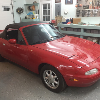 Organized Garage With Red Convertible and Tool Storage - Pamela from Hopewell, VA