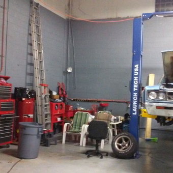 Organized garage with car lift, tool chest, and air compressor - MC5Fan from Clinton Township, Michigan