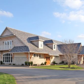 Large stone garage with wood doors and dormer windows - Steve from London, Ontario