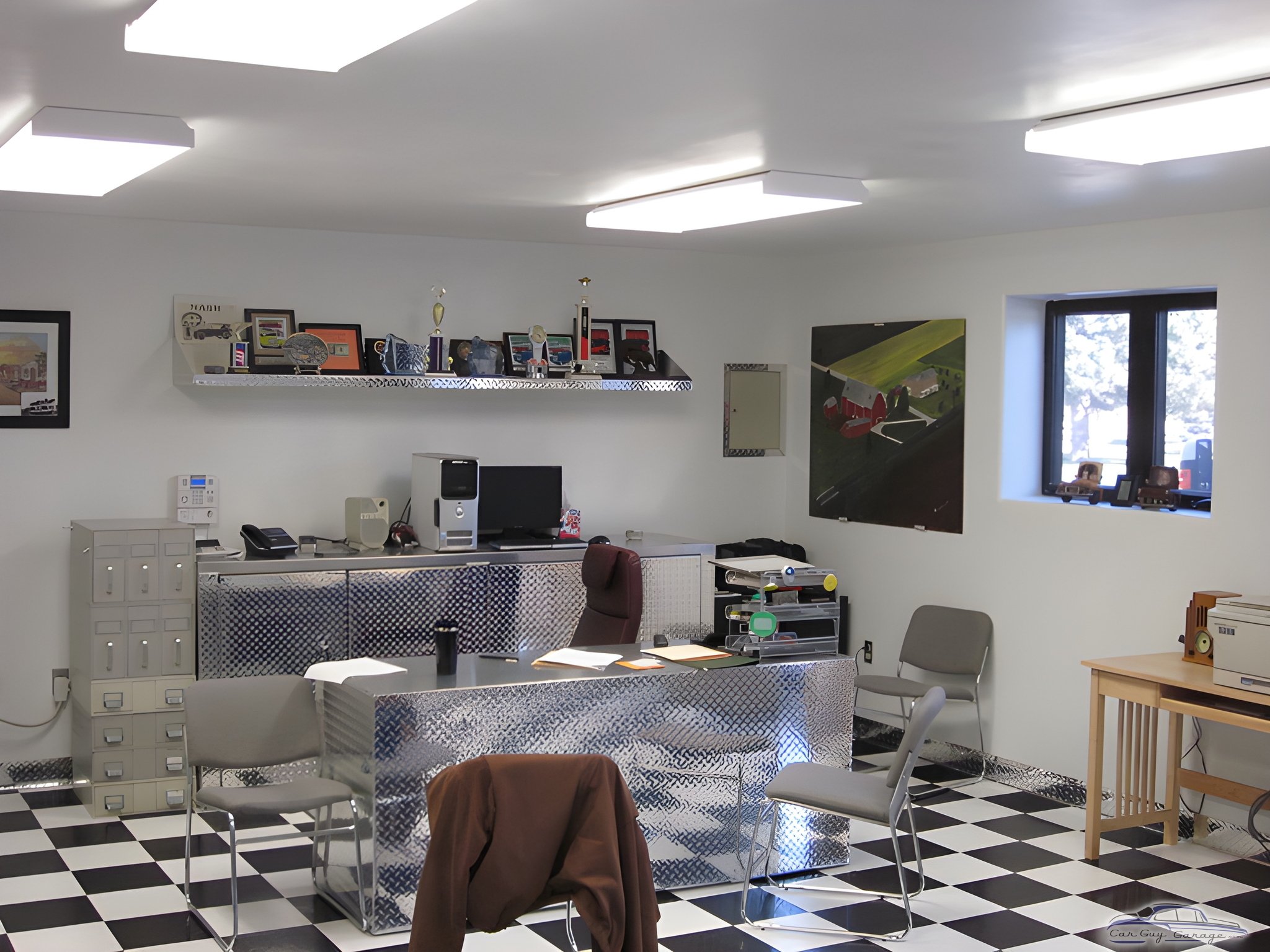 Garage Office with Diamond Plate Desk and Checkered Floor - R & L Farms from Garden City, KS