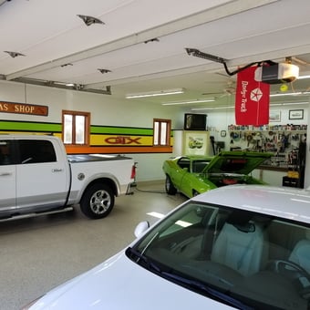 Organized garage with cars, wall art, and tools - Jerry's Garage from Trevor, WI