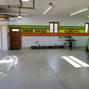 Organized garage with wall art, tools, and classic car - Jerry's Garage from Trevor, WI