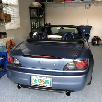 Organized garage with blue Honda S2000 and storage shelves - pauld from Bonita Springs, FL