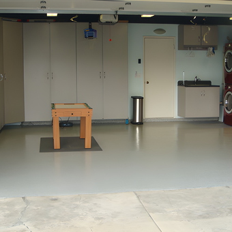 Organized garage with cabinets, workbench, and storage - Eric from Huntington Beach, CA