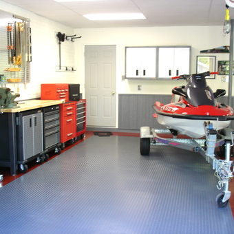 Organized garage with tool cabinets and jet ski - Dennis from Bluffton, SC