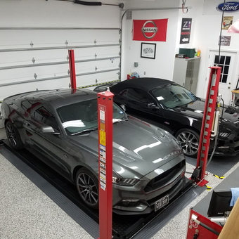Home garage with car lift, Mustangs, storage and workbench - Rusty from San Antonio, TX