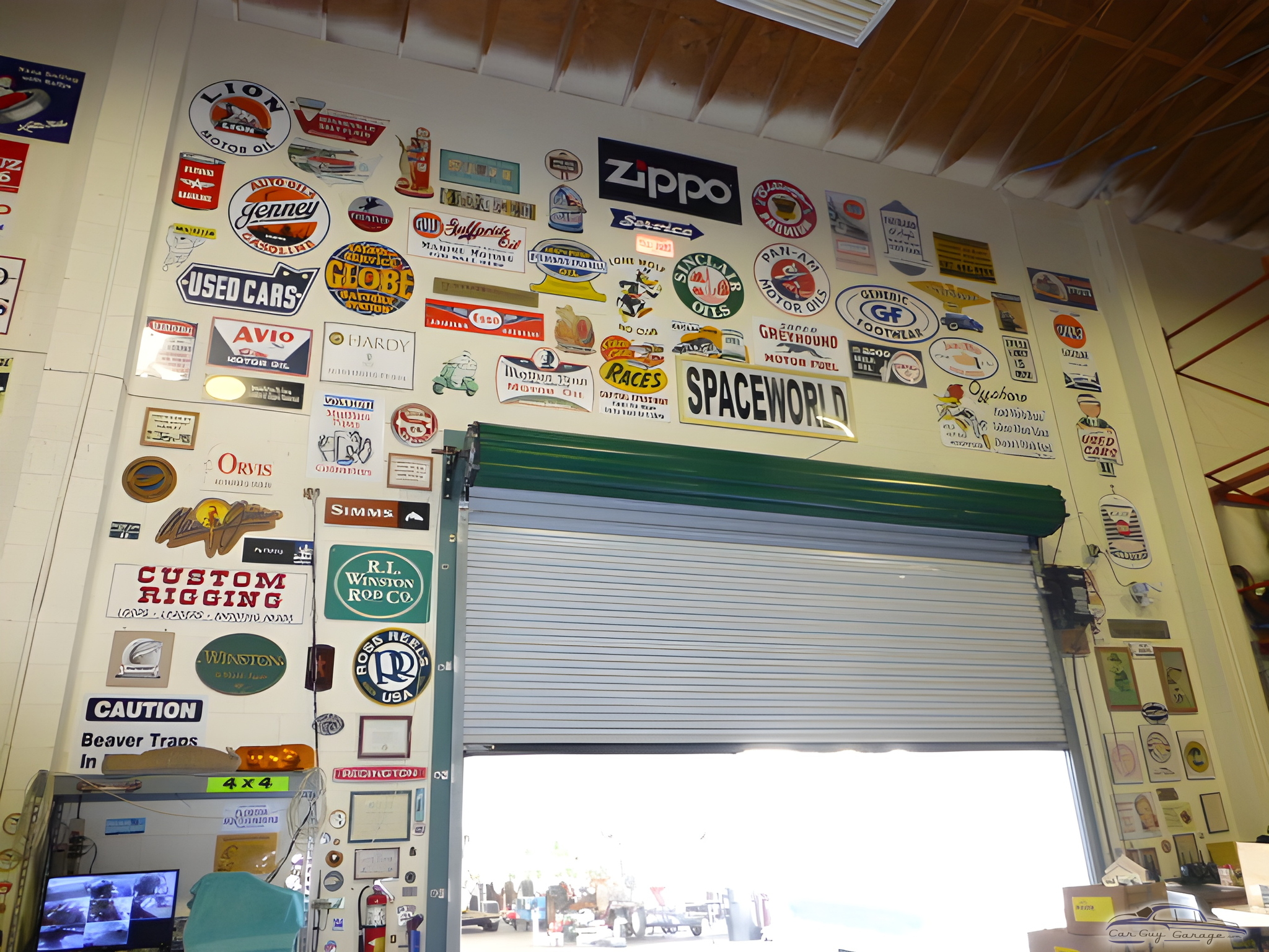 Garage wall with vintage signs and collectibles - Cliff from Titusville, FL