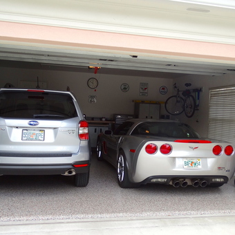 Organized garage with storage cabinets and vehicles - Bob from Delray Beach, FL
