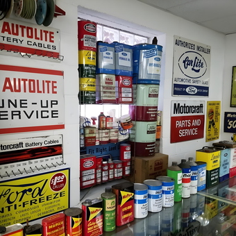 Vintage Ford Garage Signs and Oil Cans Display - The Ford Garage from nitro, WV