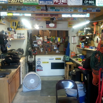 Well-Organized Garage with Tools and Equipment - Thug Hunter from MO