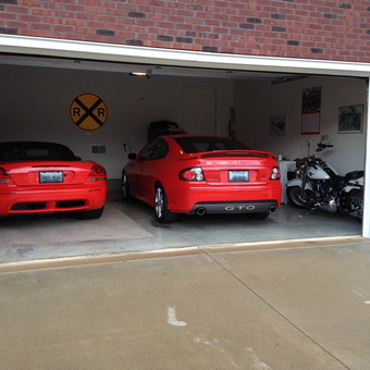 Garage with Two Red Sports Cars and Motorcycle - Jim from Bardstown, KY