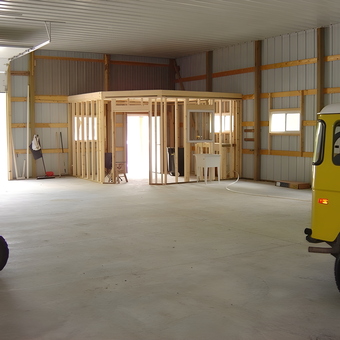 Spacious metal garage with framed office and vehicles - Greg from Johnston, IA