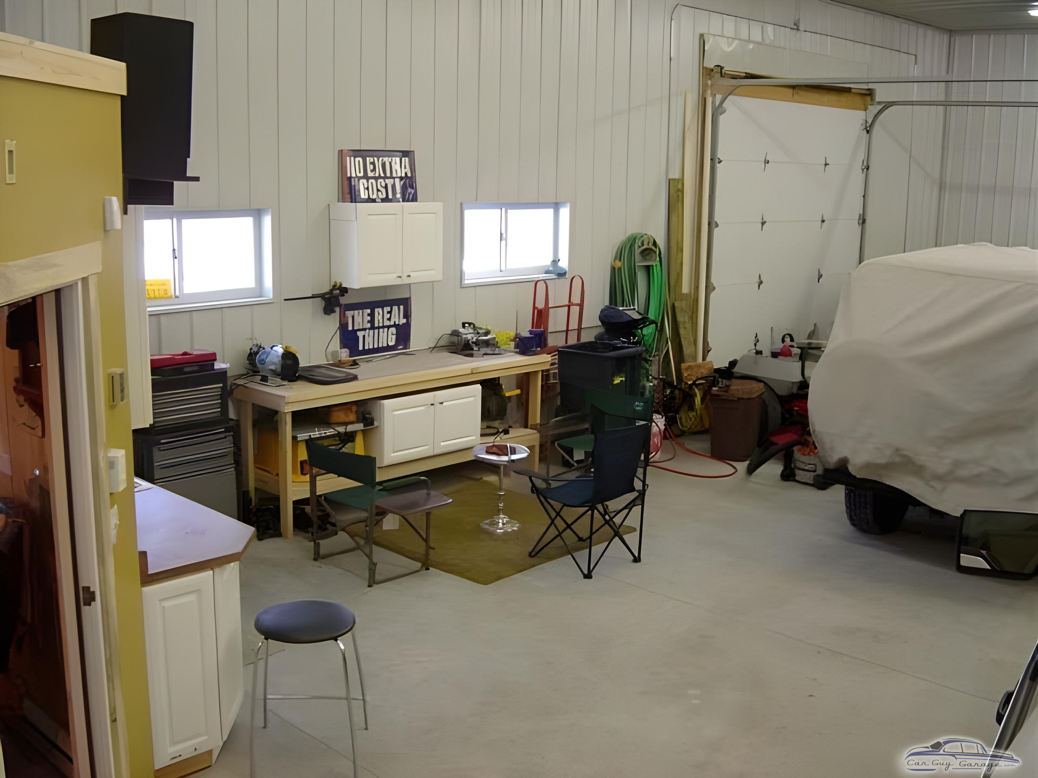 Organized Garage Workspace with Storage Cabinets - Greg from Johnston, IA