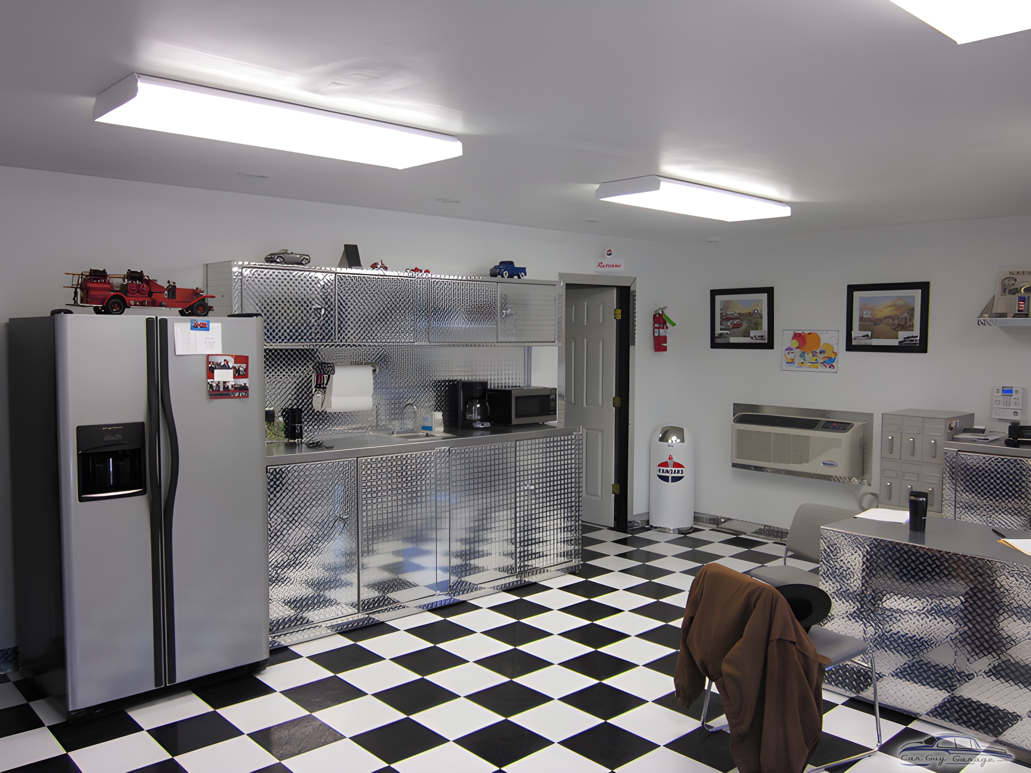 Diamond Plate Cabinets and Checkered Floor Garage - R & L Farms from Garden City, KS