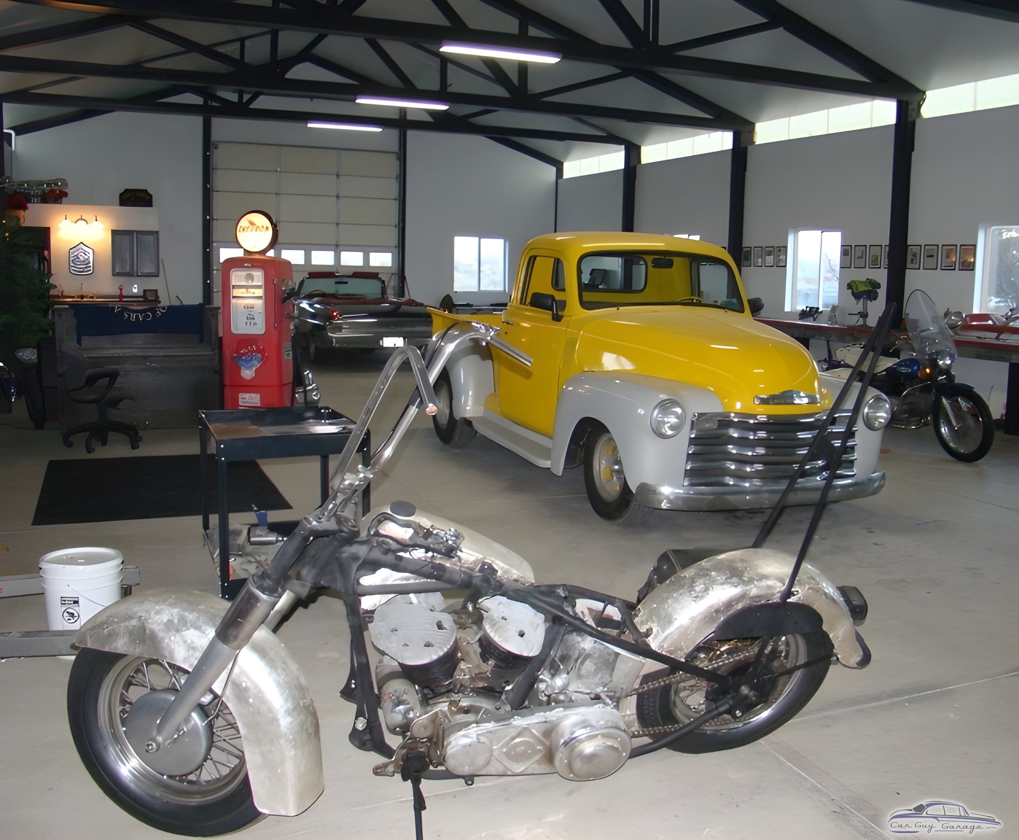 Classic Garage with Yellow Chevy Pickup and Vintage Motorcycle - Skull from WELLINGTON, NV