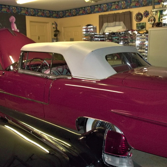 Classic Car Garage with Diecast Displays and Wall Art - caddyman