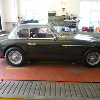 Classic Car in Organized Garage with Tools and Workbench - David