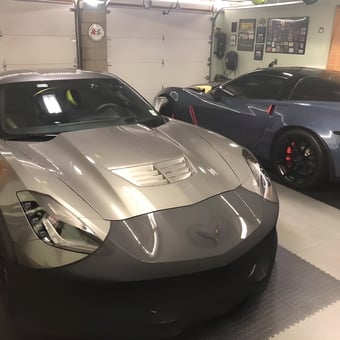 Two Corvettes in Finished Garage with Wall Decor - chet from HOWELL, NJ