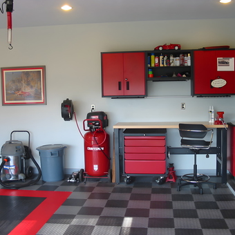 Organized Garage Workspace With Red Cabinets and Tools - Bob from New Orleans, LA