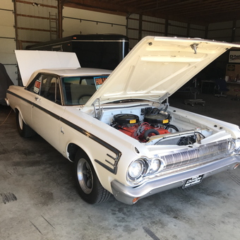 Classic white Dodge with open hood in garage - John from Hartford, MI