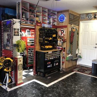 Organized garage with tool chests, wall decor, and storage - James from Sumter, SC
